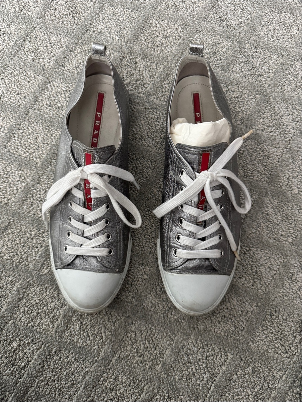 Prada Silver Leather Low-Top Sneakers with White Accents and Red Logo, 41